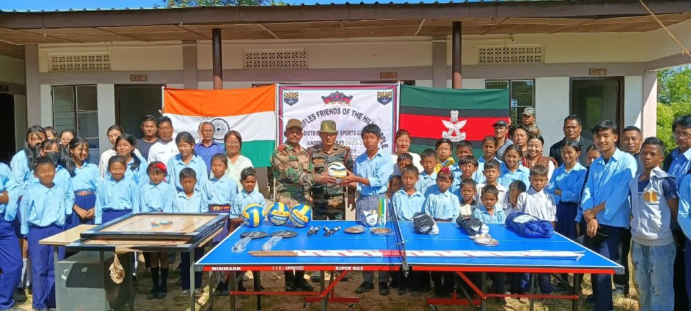 Assam Rifles distributed sports equipment to students of Government School at New Ralan, Wokha in the presence of the Village Chairman, New Rala, Wokha on November 15. Sports equipment such as footballs, volleyballs, table tennis board & paddles, badminton nets and shuttles, carrom boards, javelins and skipping ropes, etc. were distributed. Students, teachers and leaders of the village also had a football exhibition match.